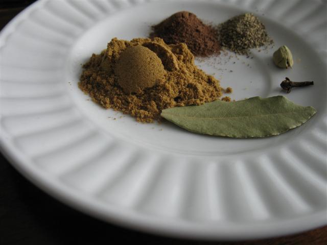 img_4081-small2 Clockwise From the Bottom: Bay Leaf, Cumin, Allspice, Black Pepper, Cardamom, Clove