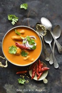 Indian Butter Chicken Recipe (Murgh Makhani) with Vintage Spoons on Antique Metal Tray