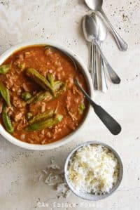 Persian Okra Stew (Khoresh Bamieh) with Small Bowl of Rice and Vintage Spoons