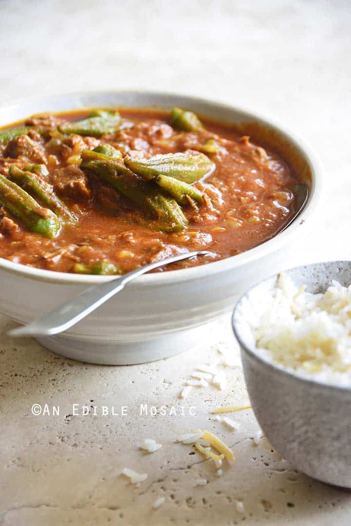 Front View of Persian Okra Stew (Khoresh Bamieh) with Spoon