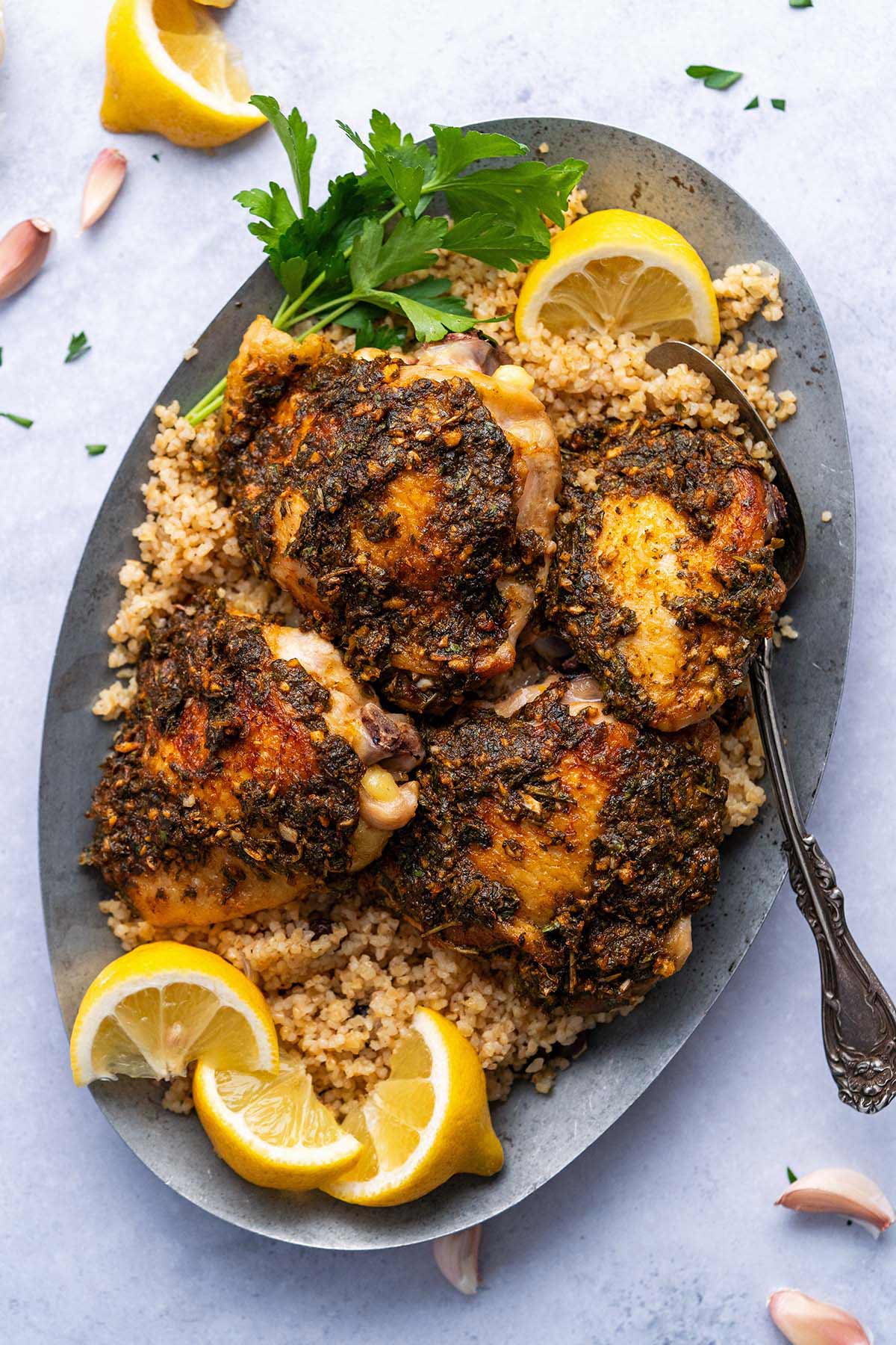 platter of moroccan chermoula chicken with pilaf