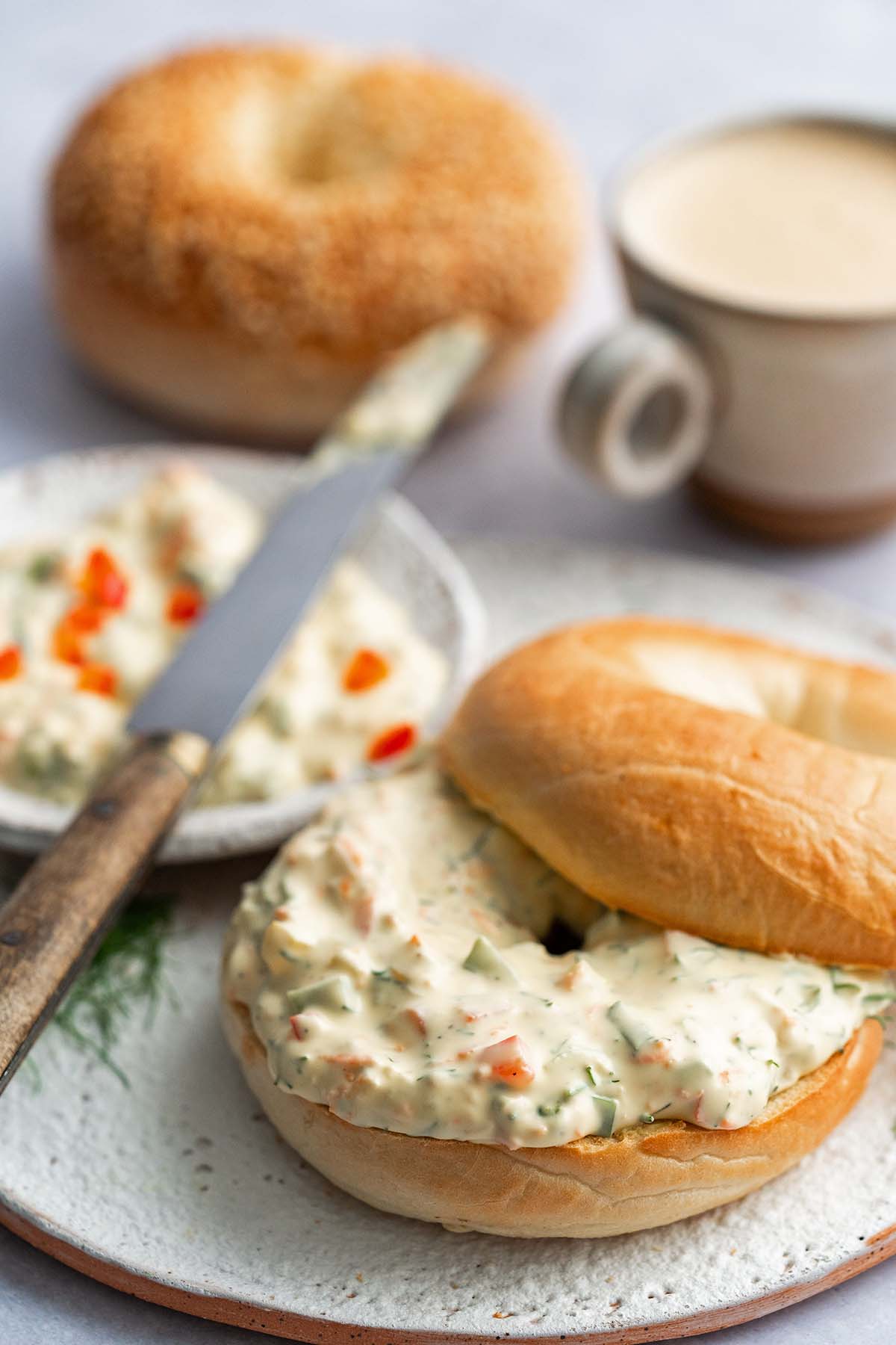 front view of bagel with garden veggie cream cheese