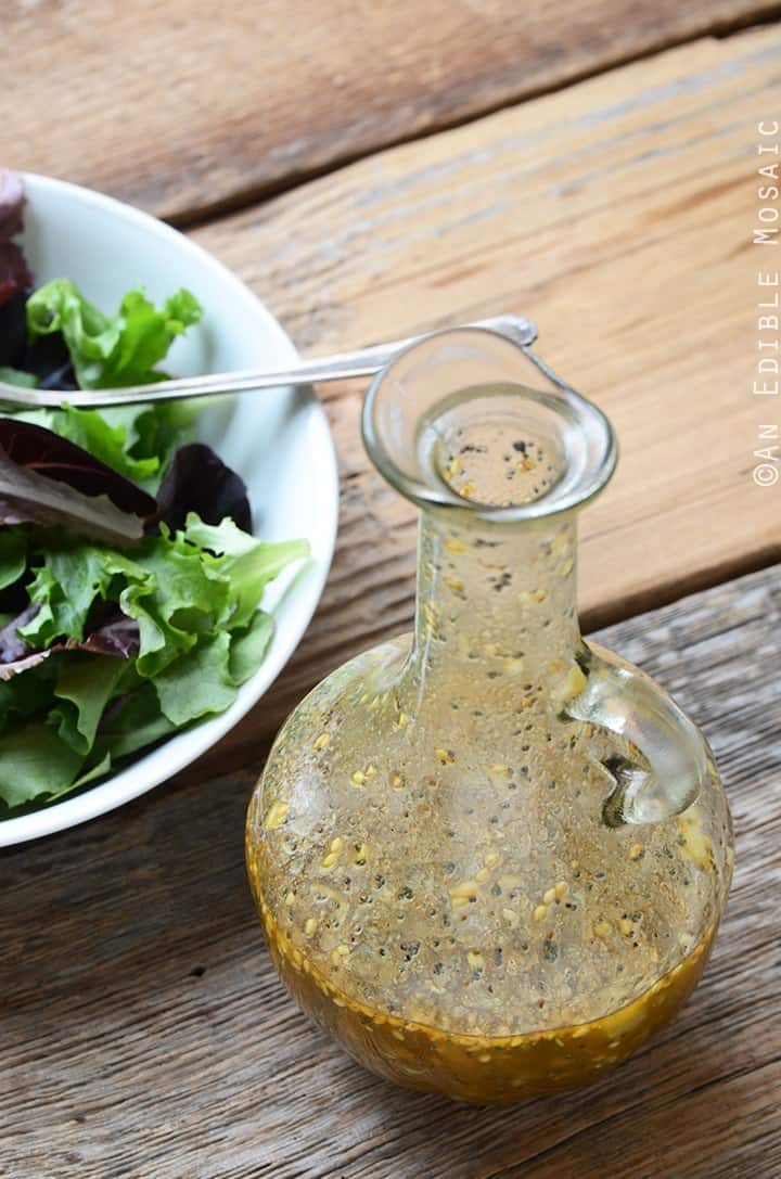 Best Dressing for Salad in Glass Bottle on Wooden Table