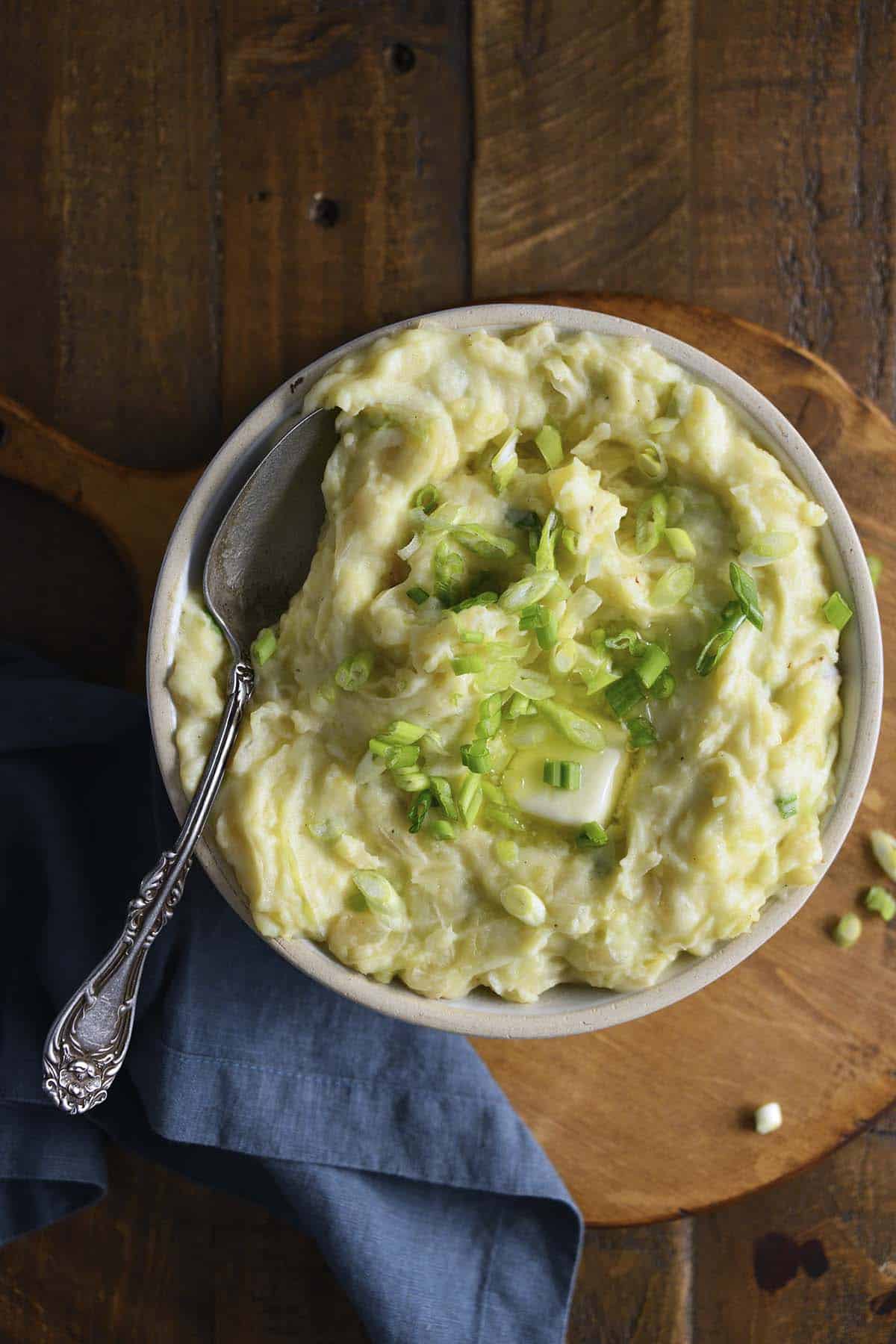 top view of bowl of irish colcannon on wooden table