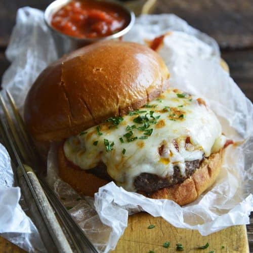 Pizza Burgers Front View on Wooden Board