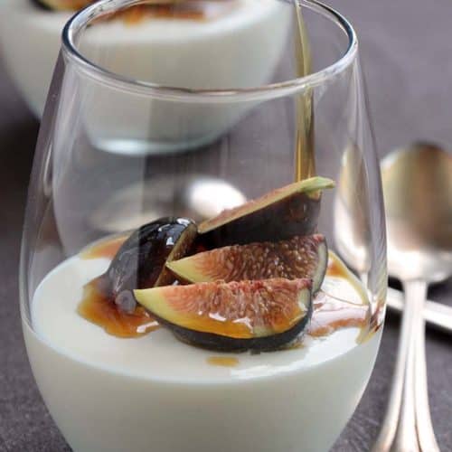 2 Glasses of Yogurt Mousse with Honey and Fresh Figs with Vintage Spoons