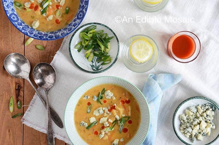 Buffalo Chicken Soup Recipe with Toppings on Table