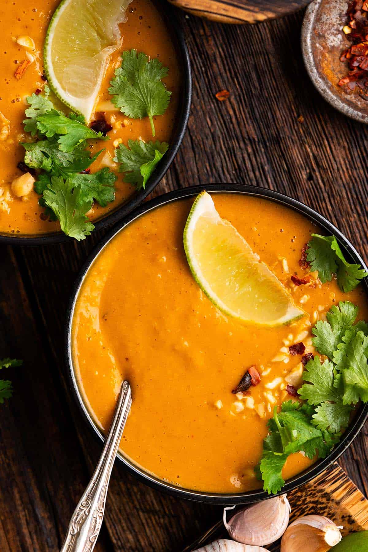 close up top view of bowl of pumpkin curry soup