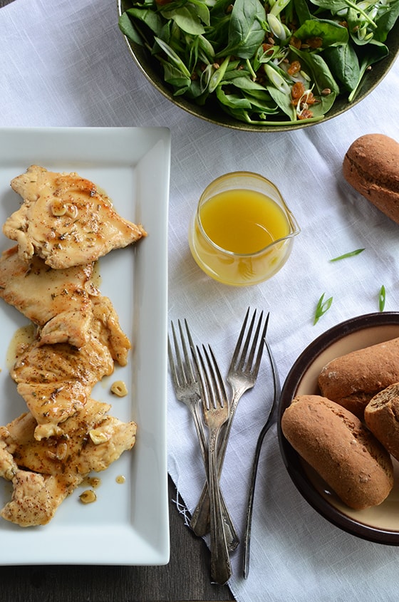 Maple Glazed Chicken Recipe on White Platter with Rolls and Salad