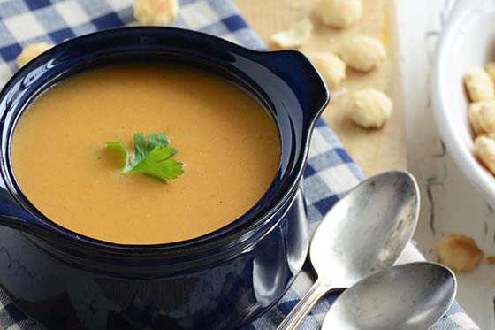 Red Pepper Smoked Gouda Soup in Blue Bowl