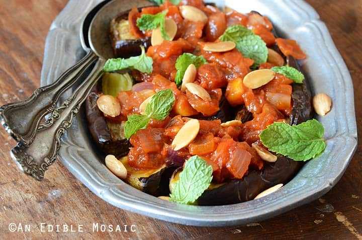 Baked Eggplant in a Silver Dish Topped with Tomato Sauce