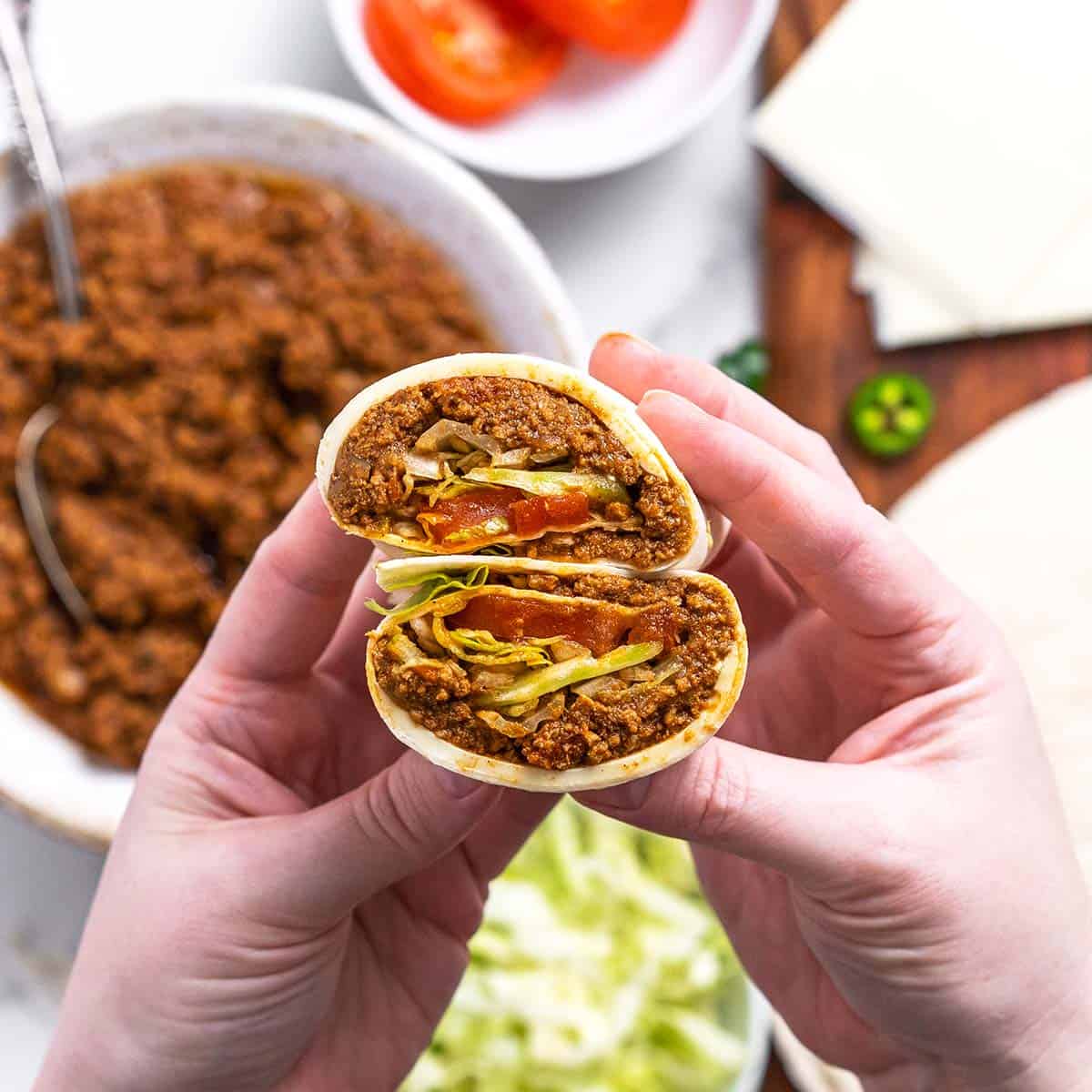 https://www.anediblemosaic.com/wp-content/uploads//2013/09/homemade-mighty-taco-beef-copycat-recipe-featured-image.jpg