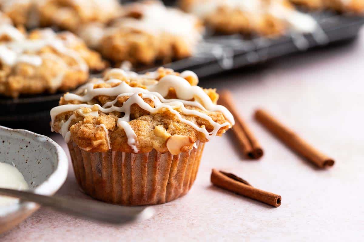 apple muffins with crumble topping and vanilla glaze
