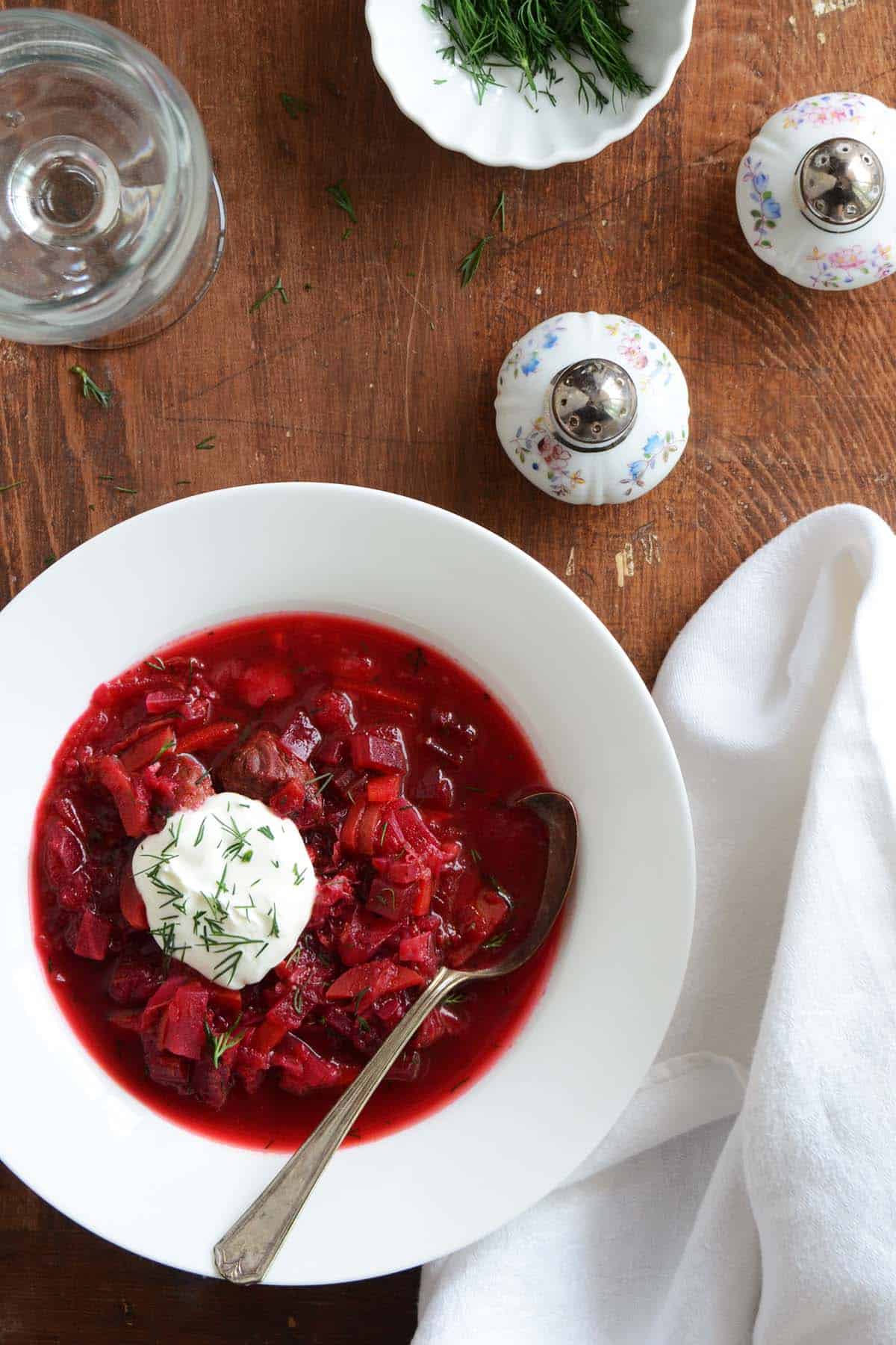 borsch in white bowl with vintage spoon
