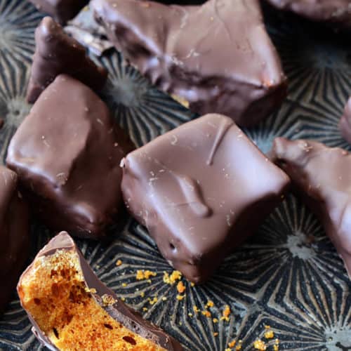 Sponge Candy Showing Inside of Candy on a Dark Metal Tray