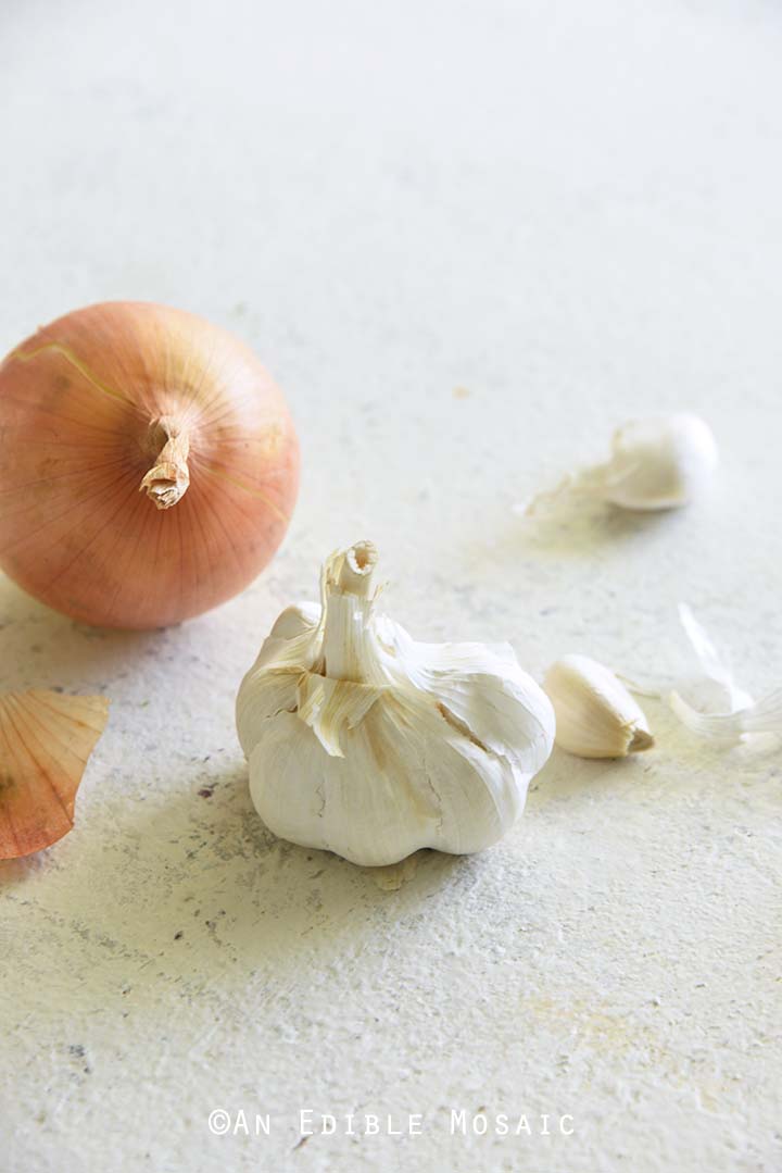 Onion and Garlic on White Table