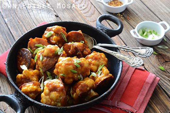 Gobi Manchurian Recipe in Black Metal Dish on Red Linen Towel