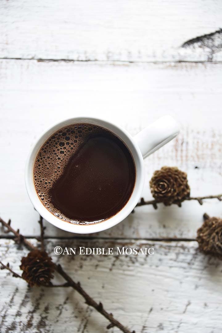 Drinking Chocolate (French Hot Chocolate) with Acorns on White Wooden Farmhouse Table