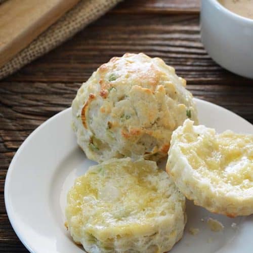 Savory Scones with Scallion and Cheese on Small White Plate on Wooden Table