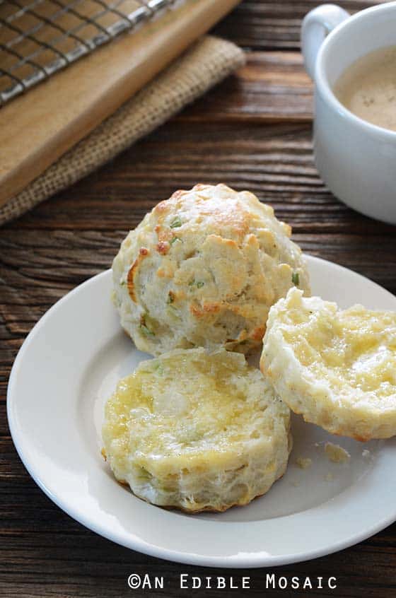 Savory Scones with Scallion and Cheese on Small White Plate on Wooden Table