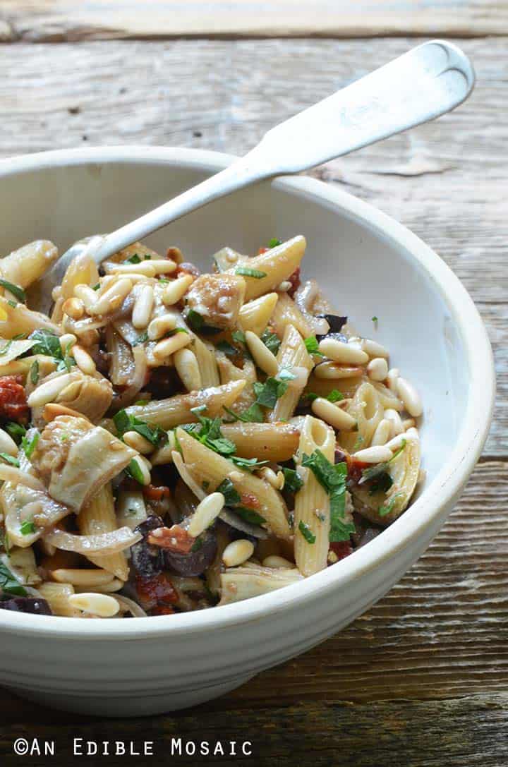 Close Up Front View of Mediterranean Pasta Salad Recipe in White Bowl