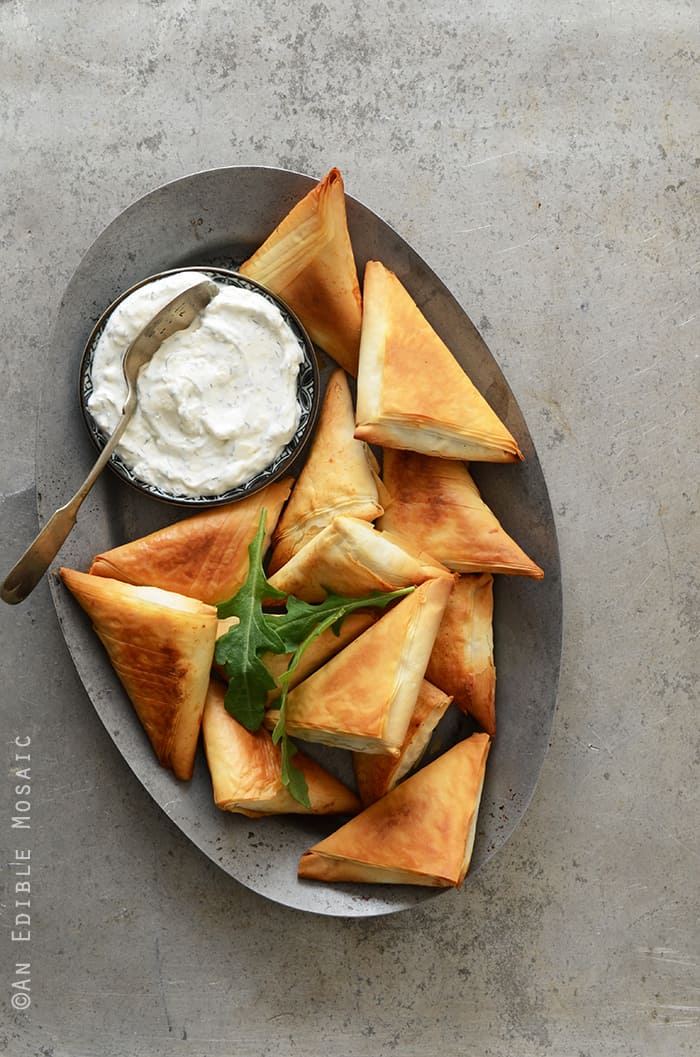 Crispy Baked Kale Phyllo Triangles with 3-Ingredient Feta Yogurt Dip