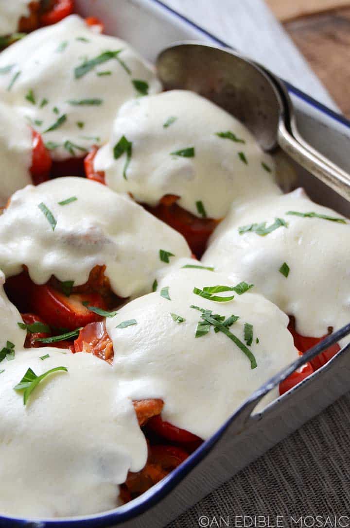 close up of pizza stuffed peppers in pan