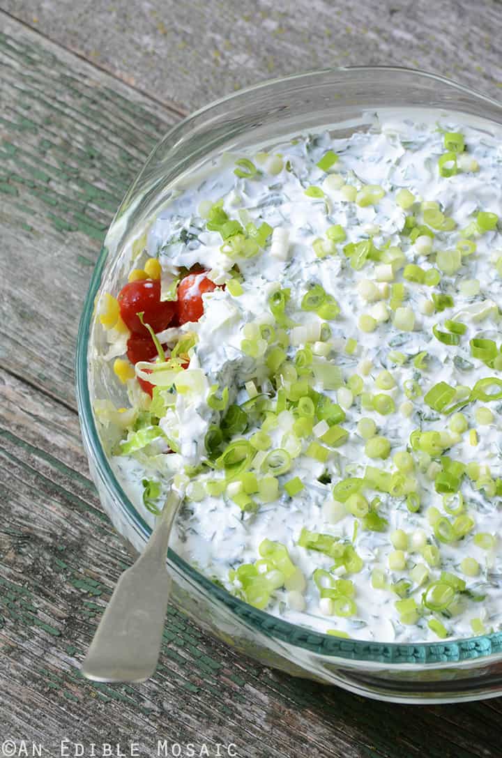 Layered Corn, Avocado, and Tomato Salad with Herbed Sour Cream