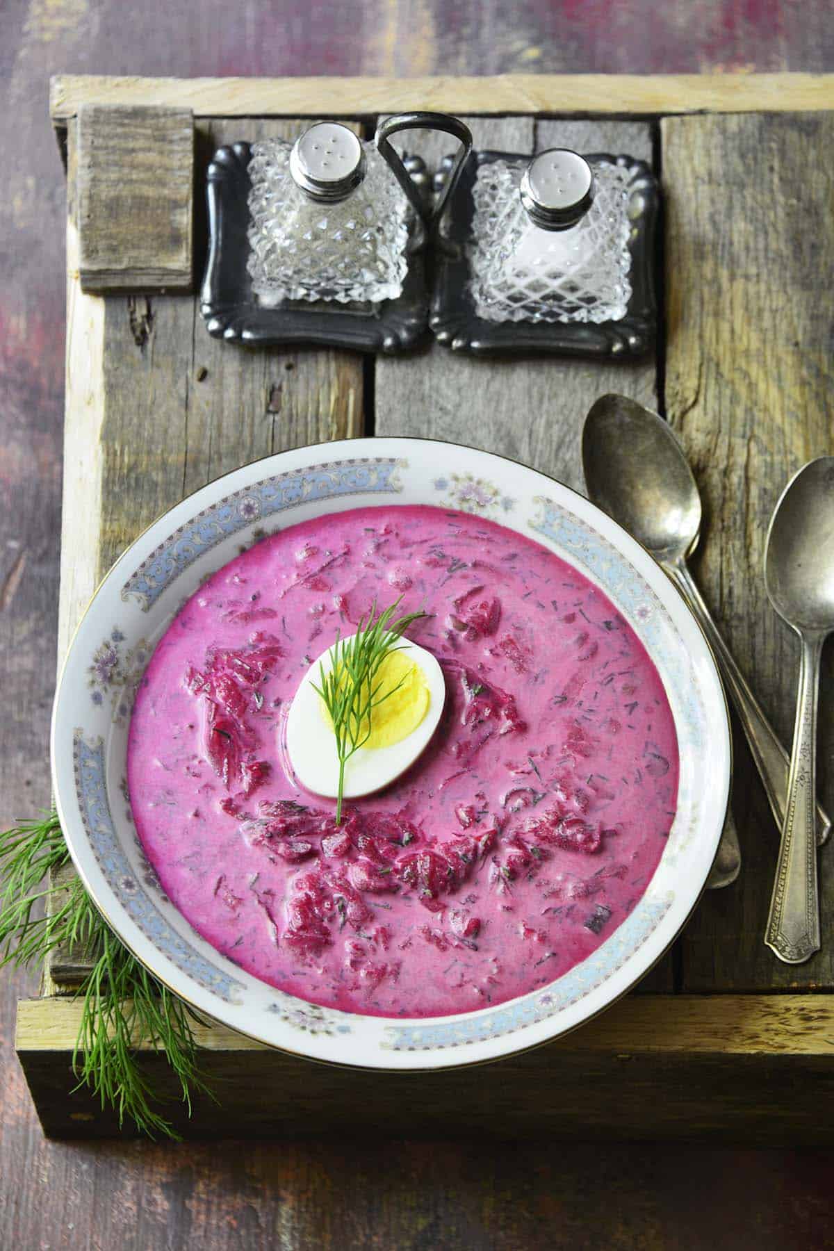 cold beet soup topped with hard-boiled egg and dill