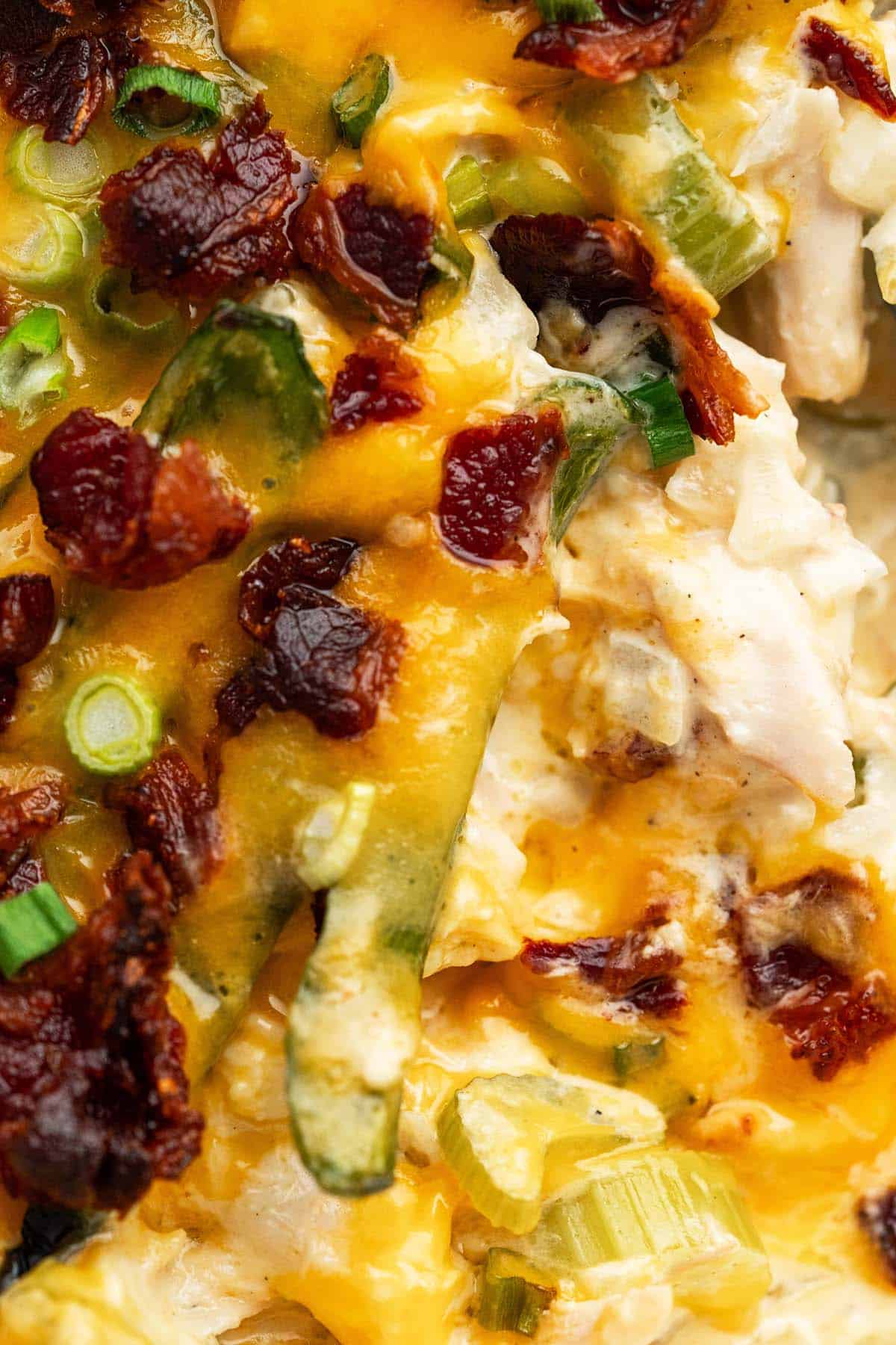 close up top view of cheesy chicken jalapeno popper casserole