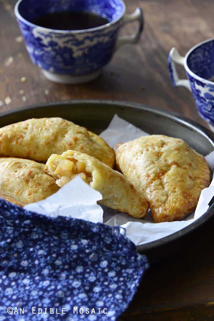 Sweet Apple Hand Pies with Cheddar Shortcrust Showing Flaky Pastry Crust Fruit Filling