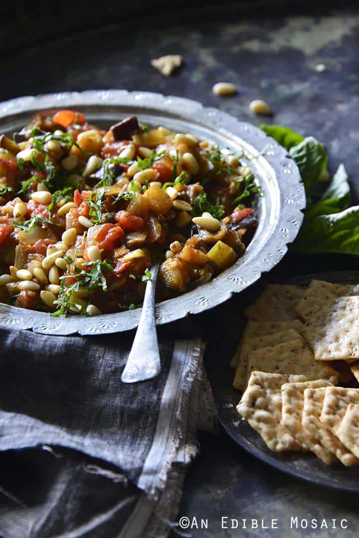 Caponata {aka Sicilian Eggplant Relish} with Crackers Side View Vertical Orientation