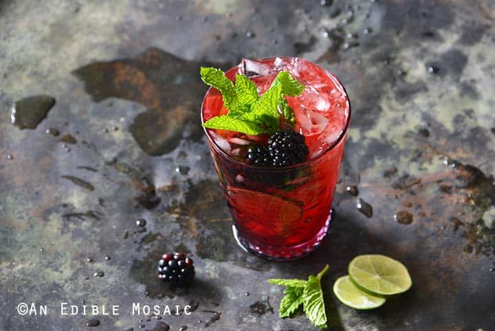 Blackberry Syrup, Mint, and Lime Spritzer Recipe on Metal Tray Front View Horizontal Orientation