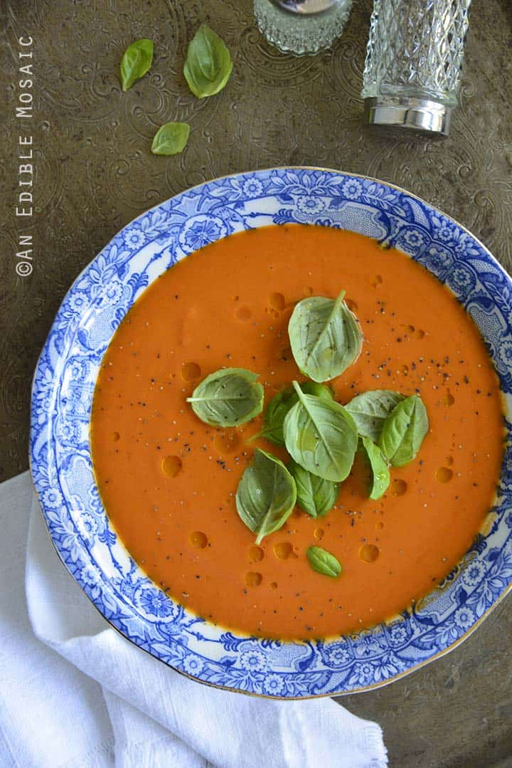 Hot or Chilled Blushing Strawberry Onion and Tomato Soup on Metal Tray Overhead View Vertical Orientation