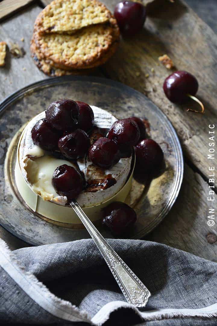 Baked Goat Brie with Balsamic-Roasted Cherries Front View Showing Gooey Cheese