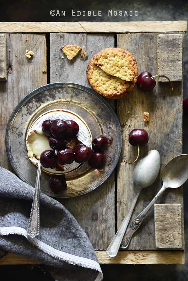 Baked Goat Brie with Balsamic-Roasted Cherries Top View Vertical Orientation