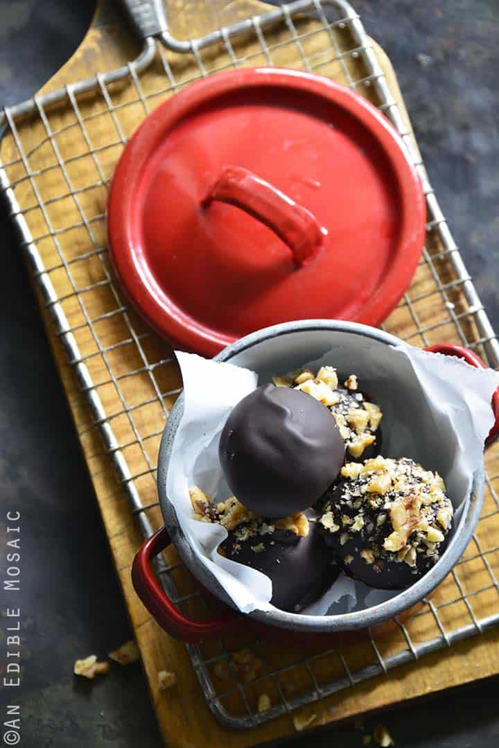Keto Chocolate-Coated Maple Walnut Cheesecake Truffles in Red Dish with Lid