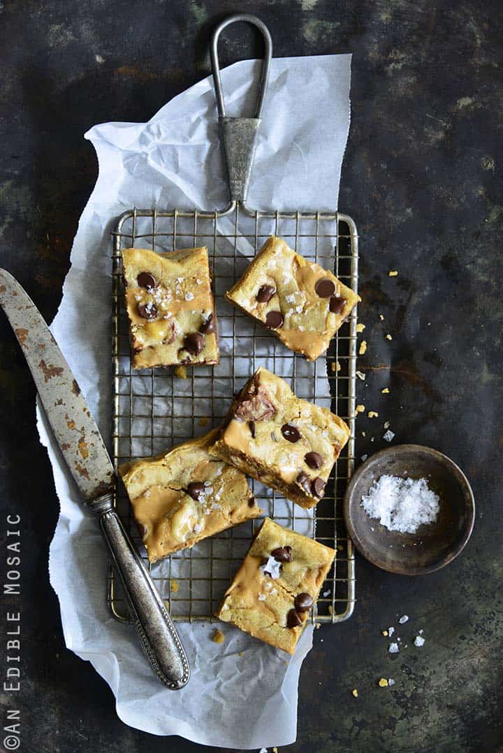 Salted Peanut Butter and Chocolate Snickers Brown Butter Blondies Overhead View on Metal Tray