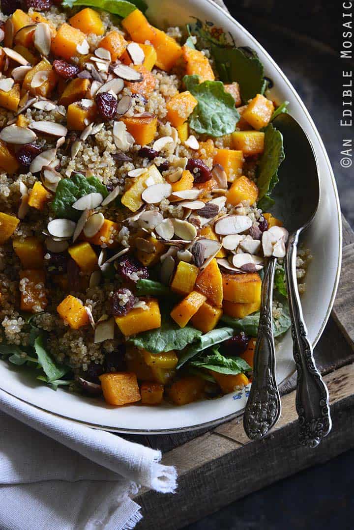 Sweet and Savory Quinoa Pilaf with Cranberries, Roasted Butternut Squash, and Toasted Almonds Front View with Wooden Crate and White Linen
