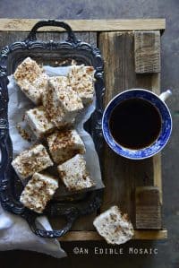 Vanilla Bean and Maple Toasted Pecan Marshmallows on Metal Tray on Wooden Table with Coffee
