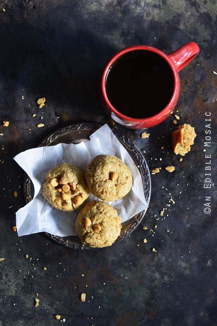 Coconut Butterscotch Granola Cookies on Small Plate with Coffee Mug