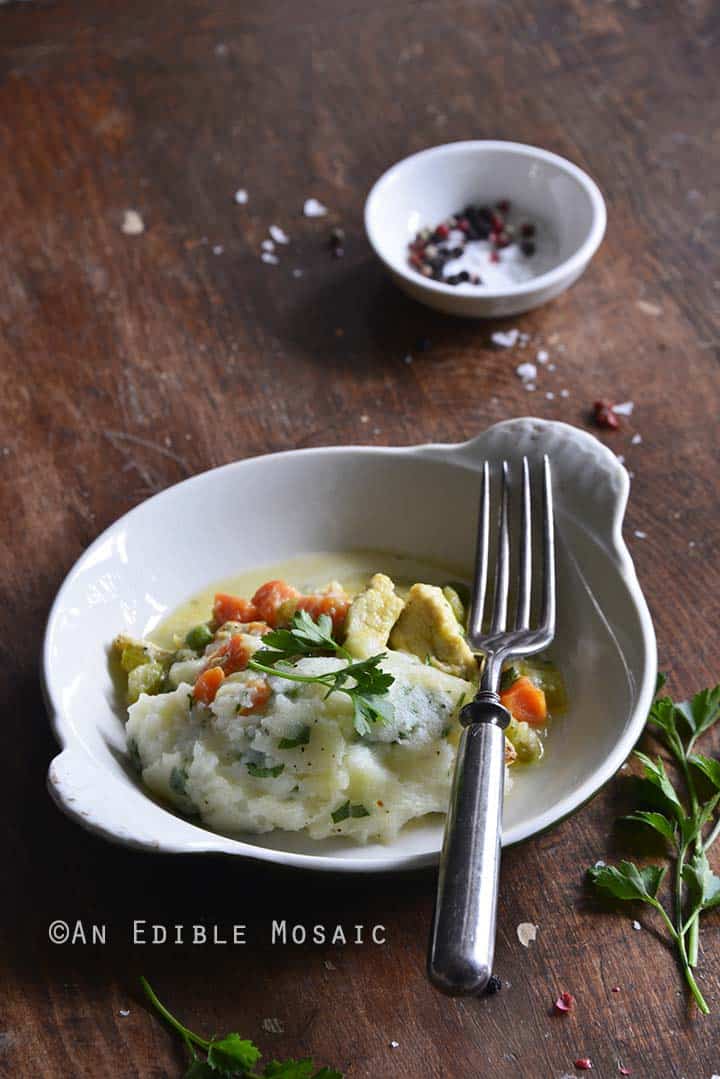 Single Dish of Chicken Pot Pie Topped with Garlic and Herb Potato Mash