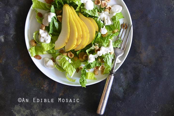 The Best Creamy Blue Cheese Dressing on Pear Hazelnut Salad Close Up
