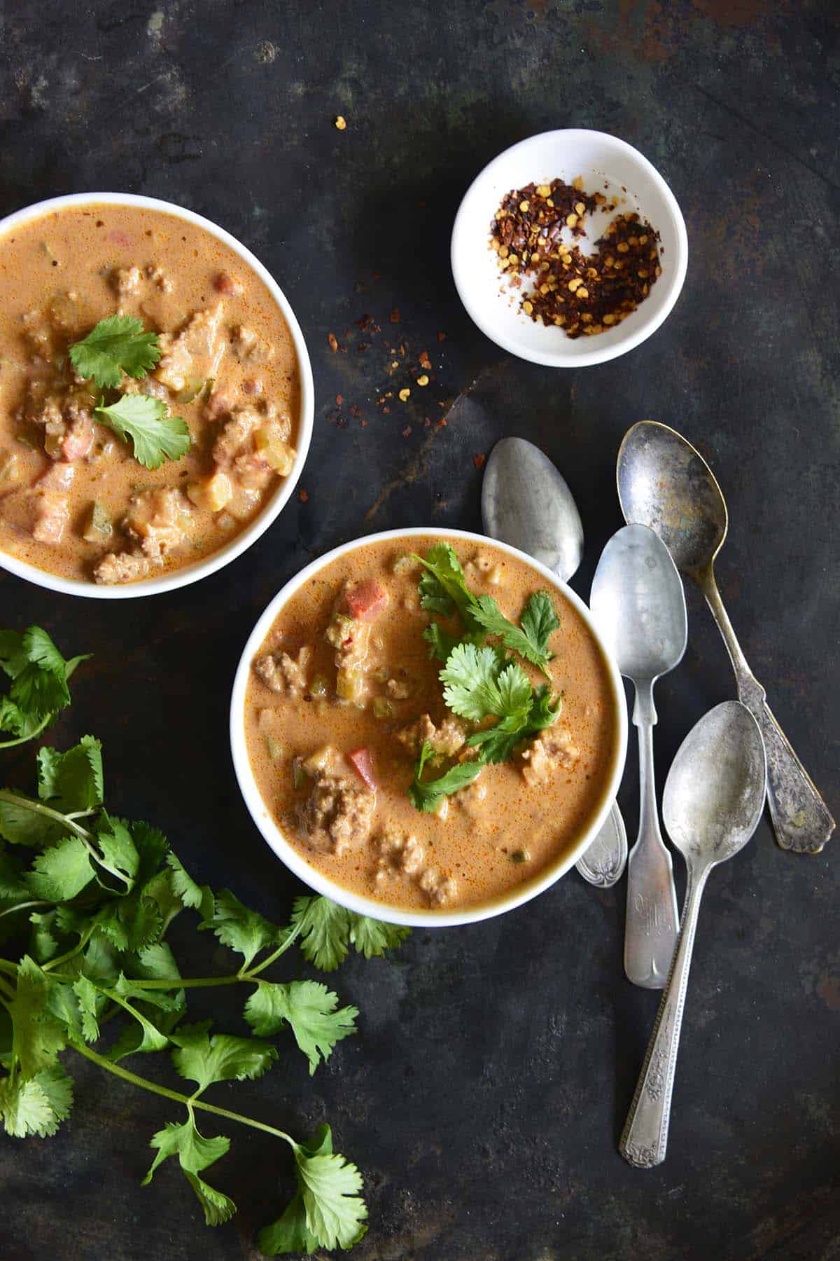 bowls of keto taco soup with cilantro