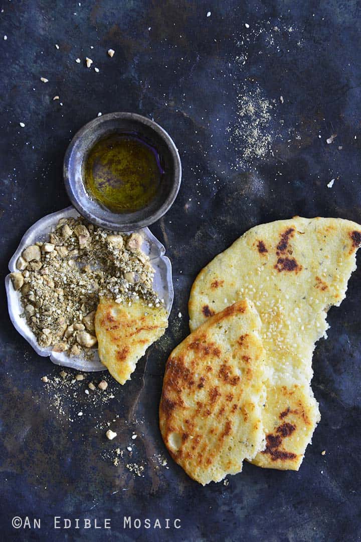 Dukkah Spice Mix with Flatbread and Olive Oil on Vintage Tray