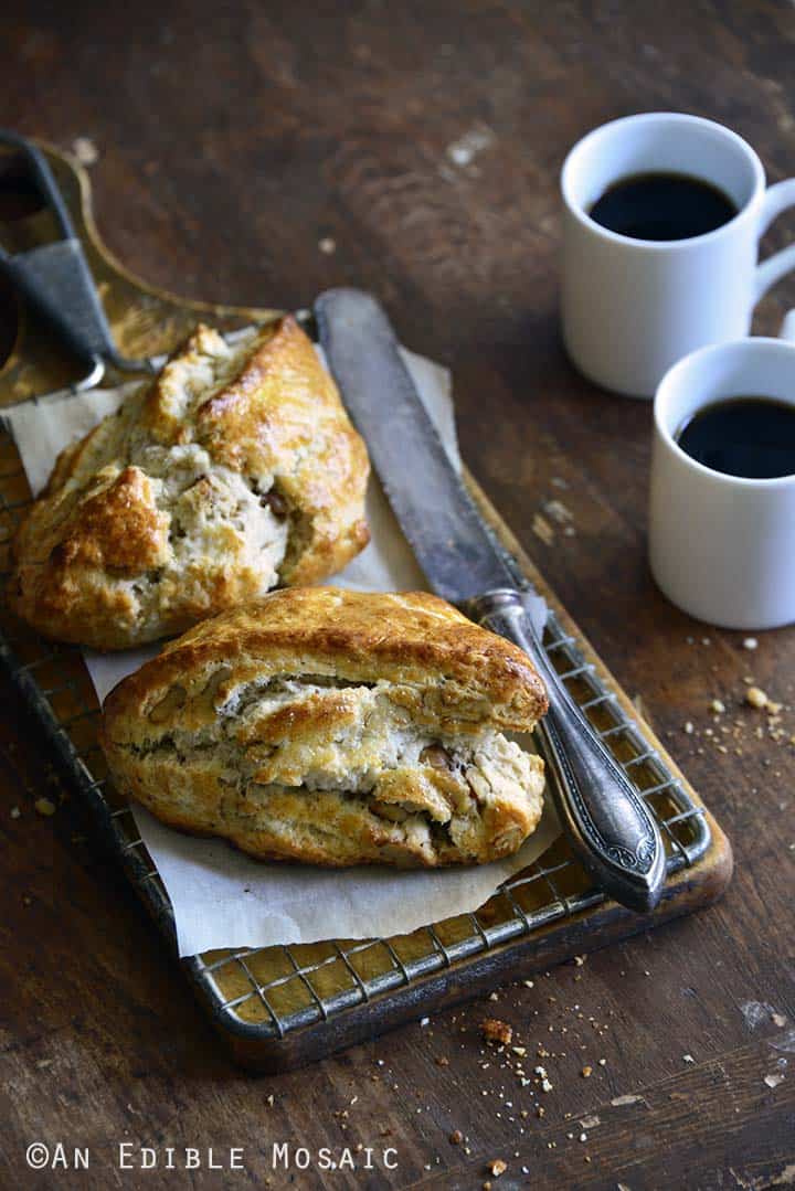 Small Batch Maple-Walnut Scones for Two on Bread Board with Coffee