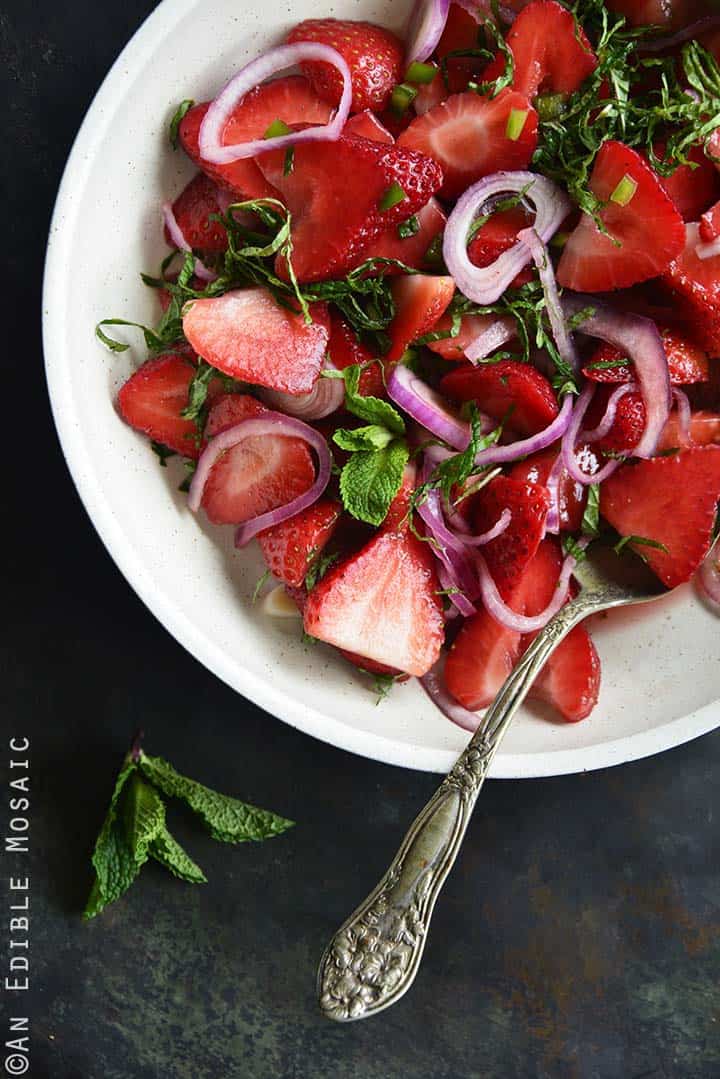 Top View of Sweet and Savory Strawberry Salad with Rosé Reduction and Fresh Mint