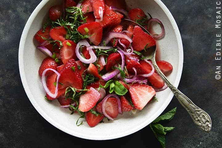 Close Up of Sweet and Savory Strawberry Salad with Rosé Reduction and Fresh Mint