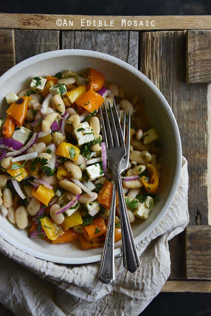 White Bean Roasted Bell Pepper Salad with Maple Dijon Vinaigrette on Wooden Table