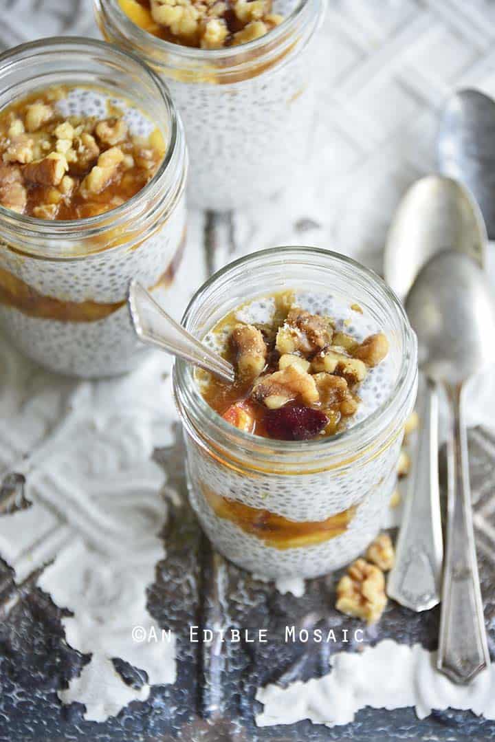 Almond Vanilla Chia Pudding with Peach Pie Topping (Low Carb Peach Dessert) on Vintage White Background